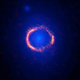 Illustration for article titled Gravitational Lens Creates A Perfect Einstein Ring Across The Universe